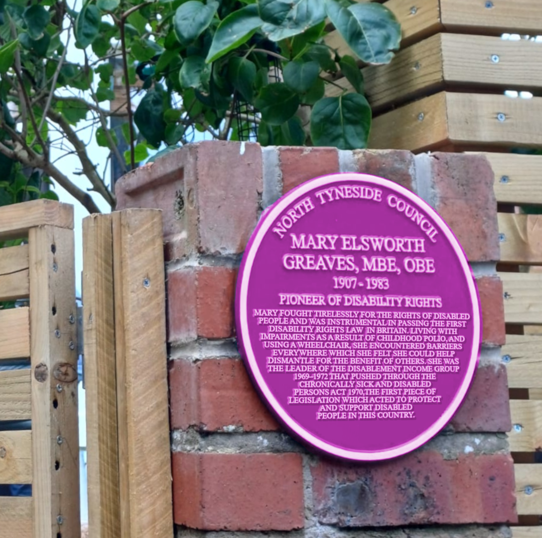 An imaged image of a purple plaque, the text on the plaque reads is the same as in the text opposite.